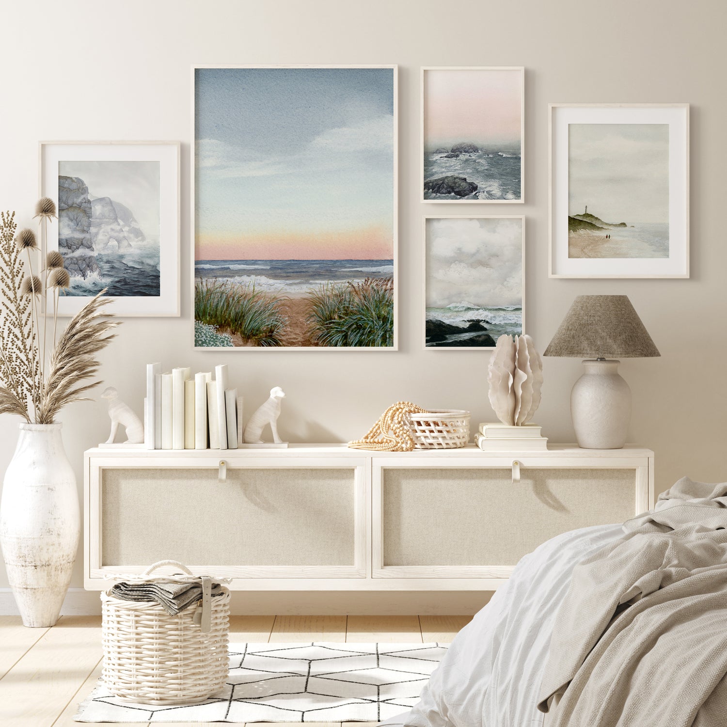 Collection of watercolour seascape ocean artworks hanging on a wall together forming a gallery look